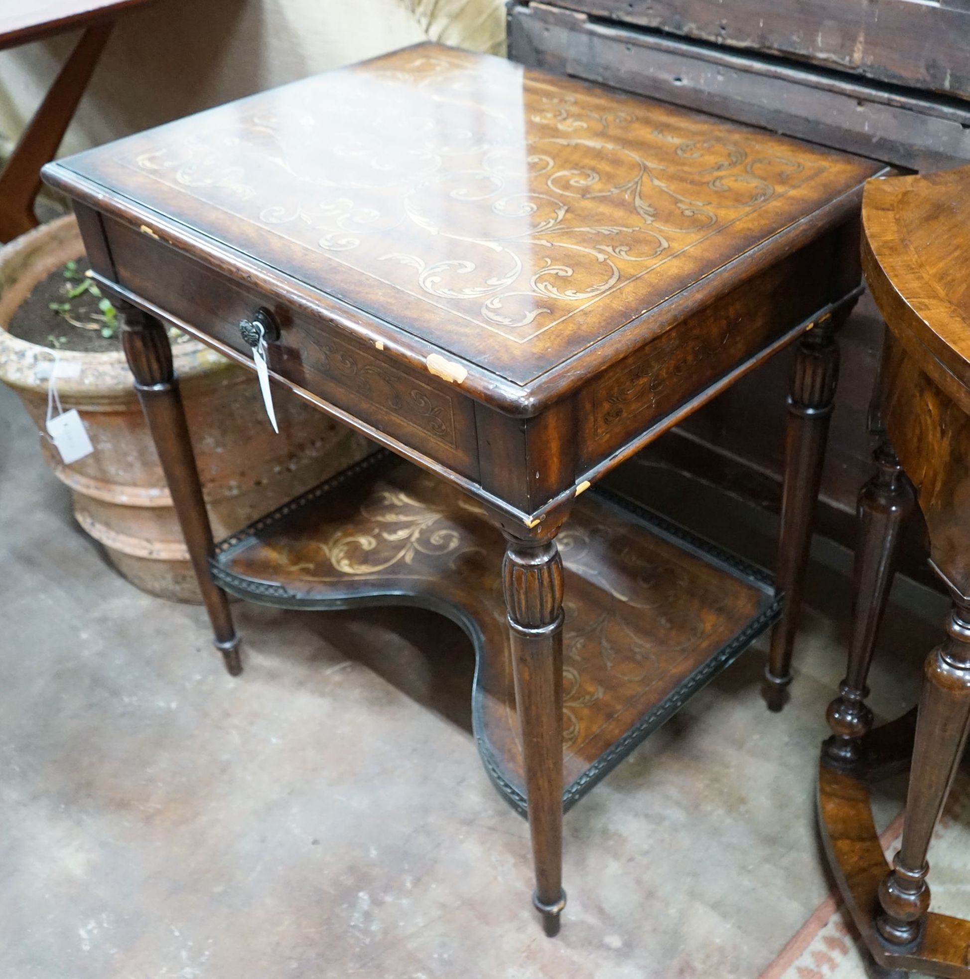 A Theodore Alexander Italian style parcel gilt walnut side table, width 66cm, depth 51cm, height 72cm